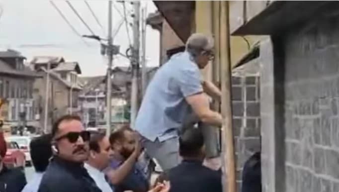 “Under what law?”: Omar Abdullah Jumps over Wall, Visits Martyrs’ Graveyard Amid Security Clampdown
