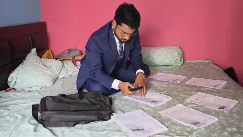 Bengal BLO Seen Filing Voter Data During His Own Wedding as SIR Pressure Mounts